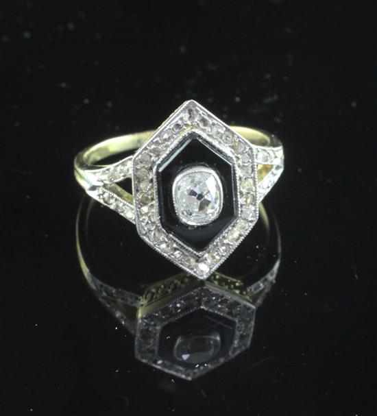 A 1930s/1940s French Art Deco 18ct gold, onyx and diamond ring, size O.